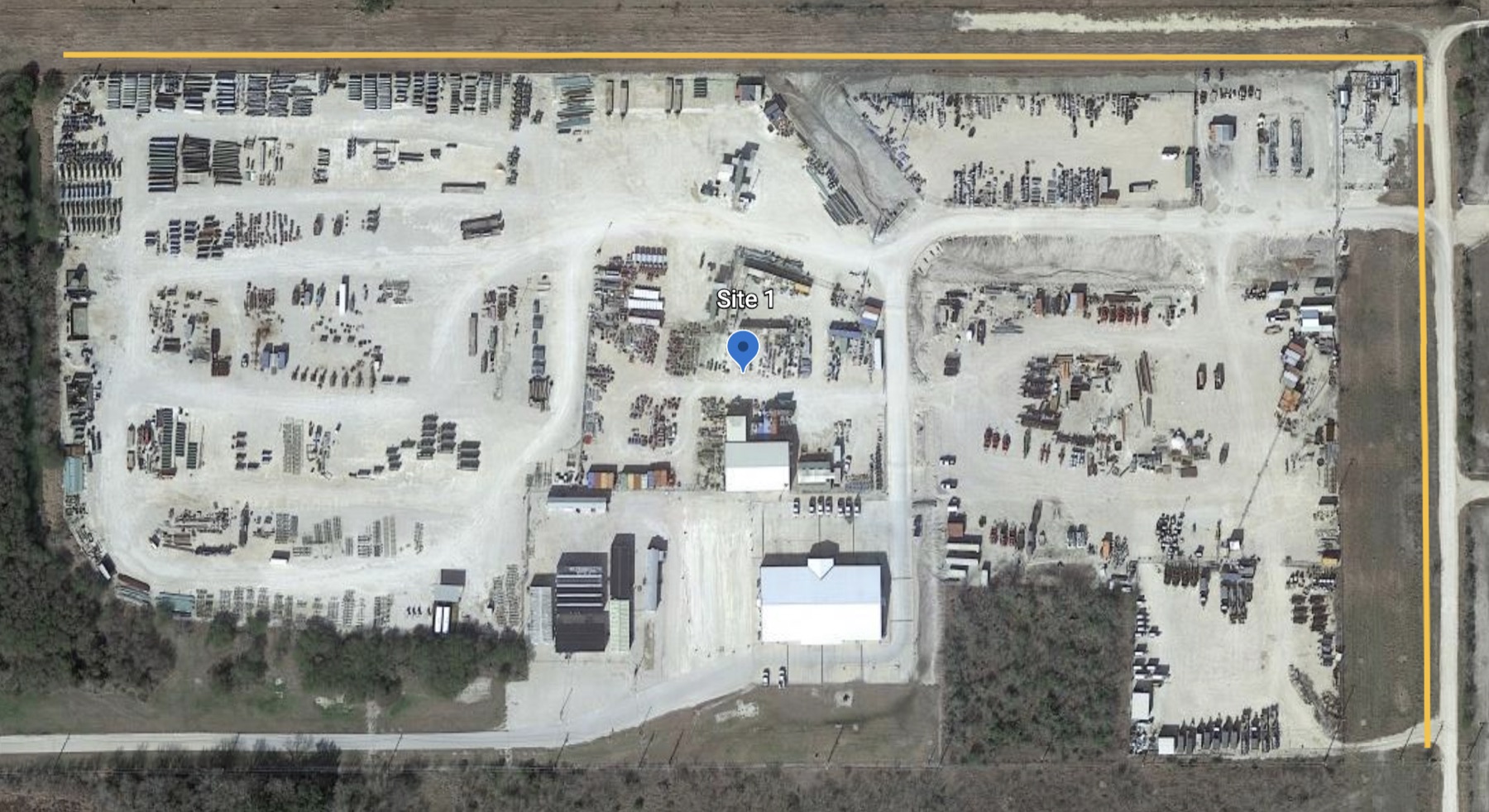Aerial view of an EOG site with coverage zone boundary and placement marker overlaid